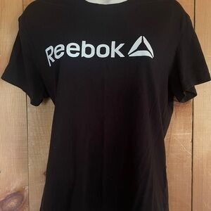 Reebok black T-shirt with short sleeves.